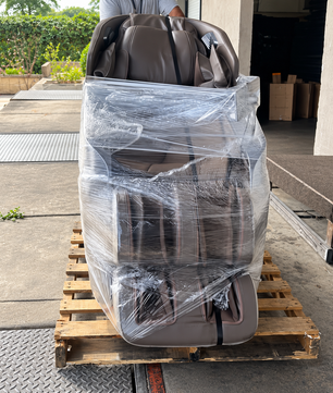 BOSSCARE SQ813 4D full body massage chair securely wrapped on a shipping pallet